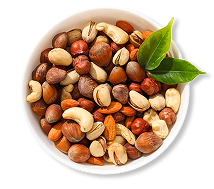assorted nuts white bowls light background
